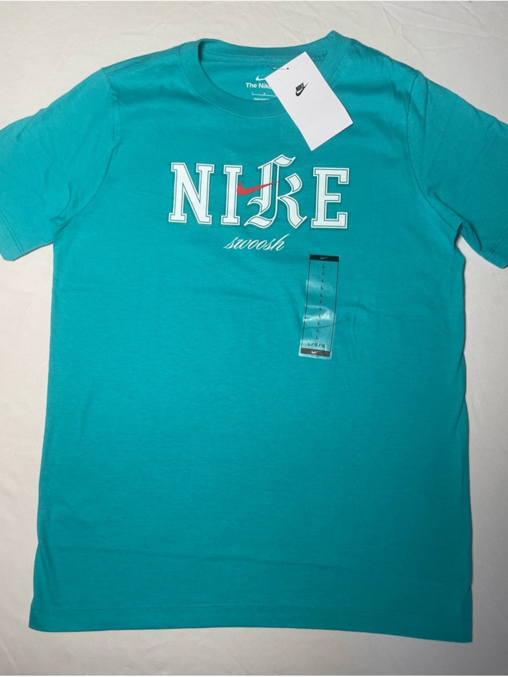 Nike Kids Graphic Logo Swoosh T-Shirt The Nike Tee Size Large Teal  NWT